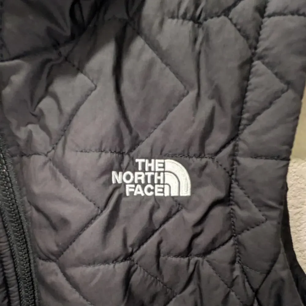 The north face black quilted puffer vest women's sizeM